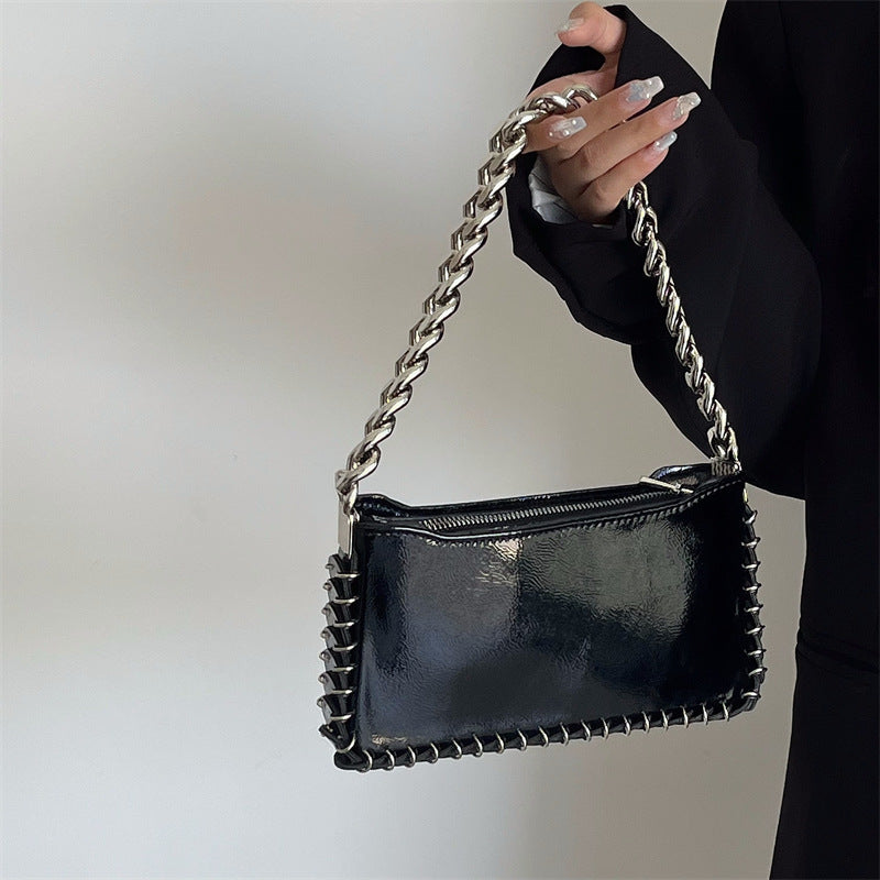 Woman Puck Black Shoulder Bag with Chains and Rings