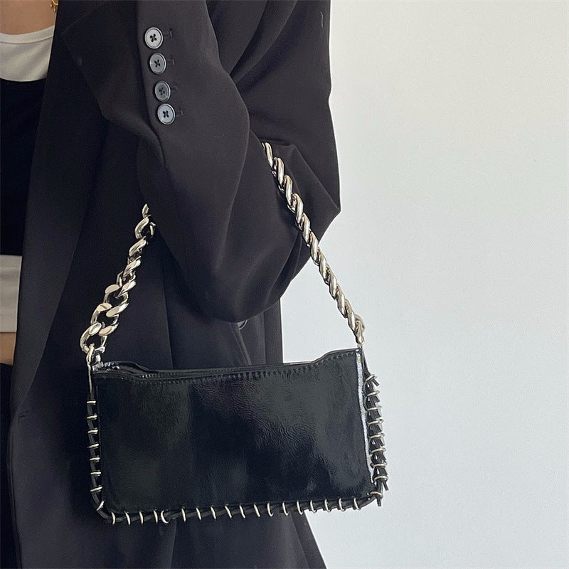 Woman Puck Black Shoulder Bag with Chains and Rings